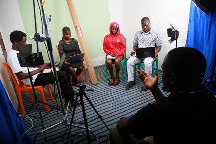 Figure 2: Image of digital marketers in the studio learning content creation